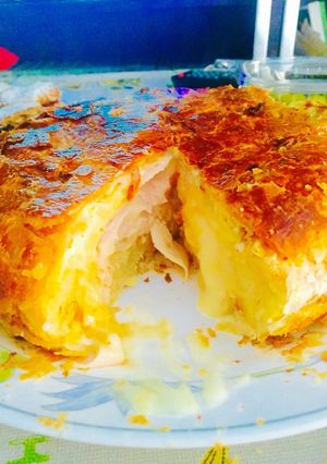 Foto principal de Hojaldre relleno de tortilla de patatas, lonchas de pavo y queso para fundir