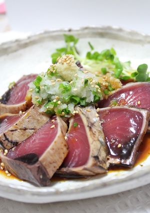 A picture of Seared Bonito with Ginger and Grated Radish.