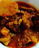 Bengali goat meat curry with potato