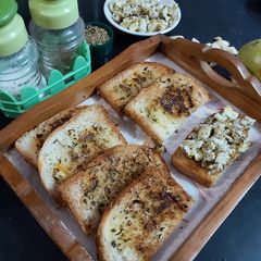 Garlic Bread with scrambled eggs A picture of Garlic Bread with scrambled eggs.