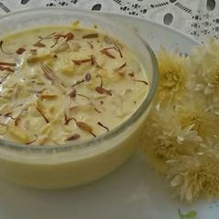 A picture of Rasmalai with leftover boiled rice.