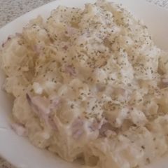 A picture of POTATOE SALAD with SOFT CHEESE.