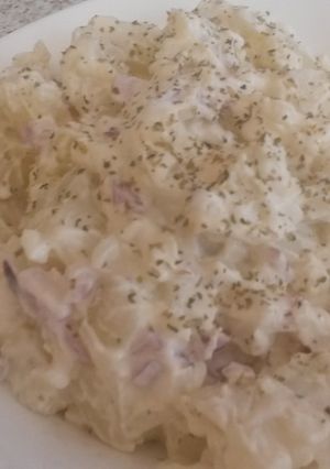 A picture of POTATOE SALAD with SOFT CHEESE.