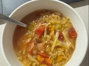A picture of cabbage and bell pepper soup