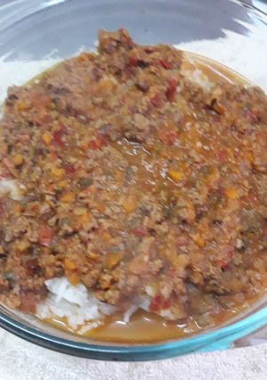 Una foto de Arroz blanco con salsa Boloñesa