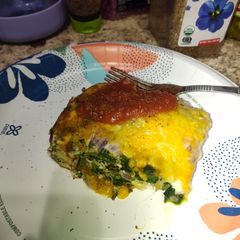 A picture of Egg and hash brown.