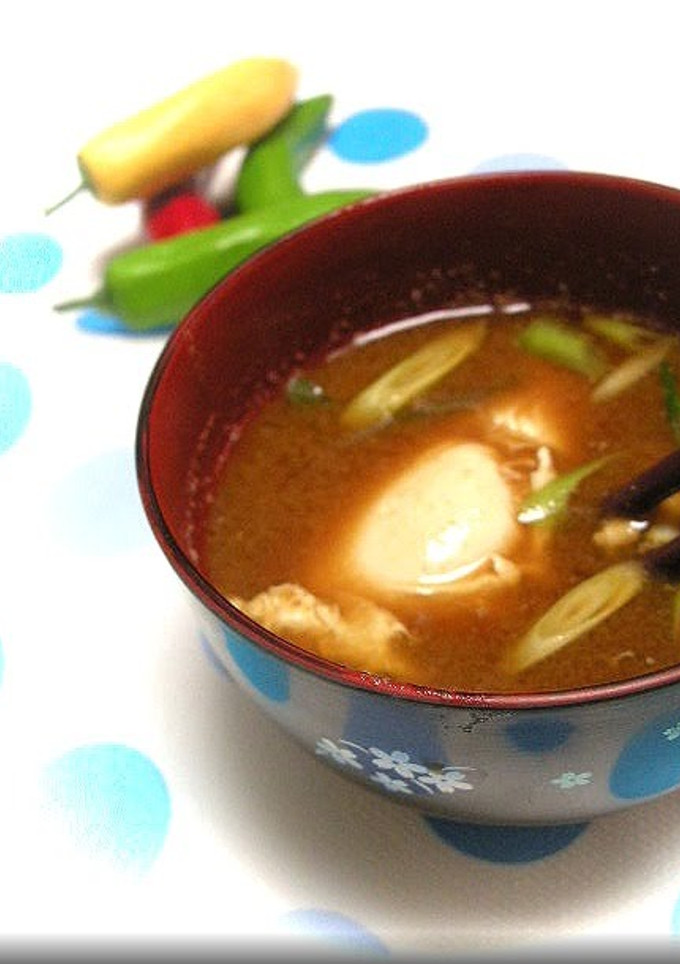 A picture of Miso Soup with a Round Microwaved Egg.