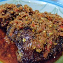A picture of Crayfish Sauce with Roast Chicken.