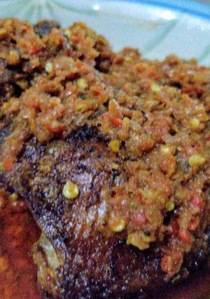 A picture of Crayfish Sauce with Roast Chicken.