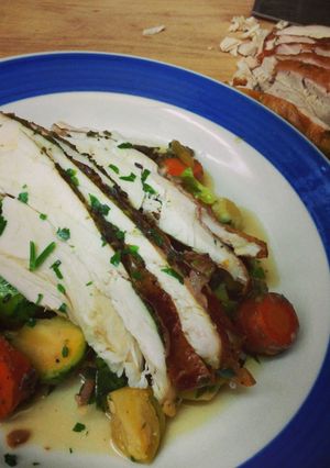 A picture of Turkey with Brussels sprouts.