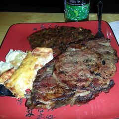 A picture of B.b.q prime rib, chile relleno, black bean chili.