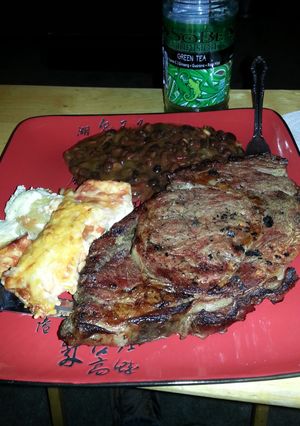 A picture of B.b.q prime rib, chile relleno, black bean chili.