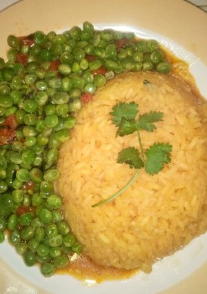A picture of Turmeric rice and peas.