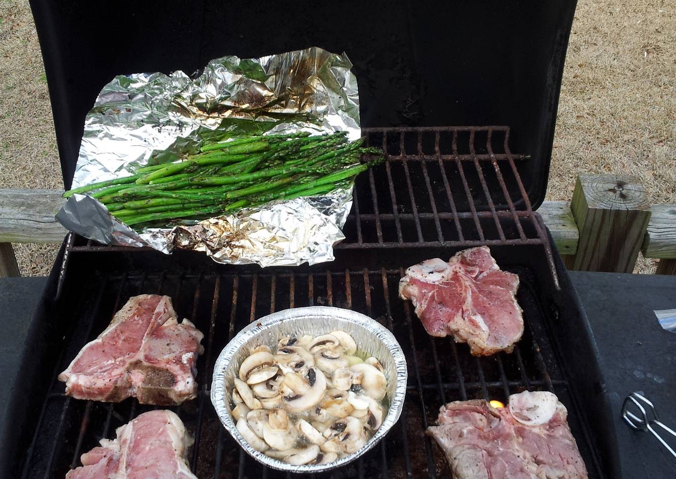 Grilled Veal Chops with Mushroom, white wine & butter.