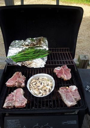 A picture of Grilled Veal Chops with Mushroom, white wine & butter..