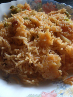 A picture of Potato and pea rice.