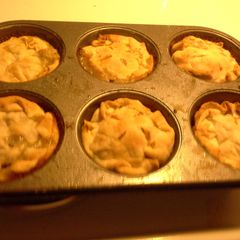 A picture of Mini chicken pot pies.