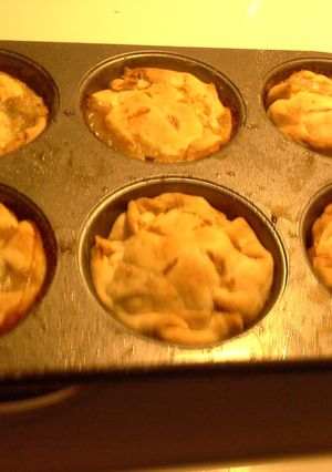 A picture of Mini chicken pot pies.