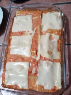 Una foto de **Canelones de queso en salsa rossini** 👏