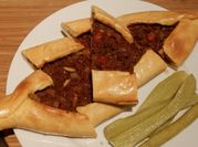 A picture of flour and minced meat
