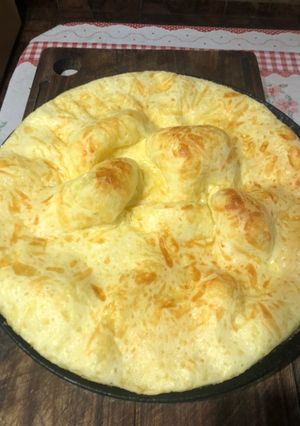 Una foto de Pan montaña rusa, con mucho queso 🧀