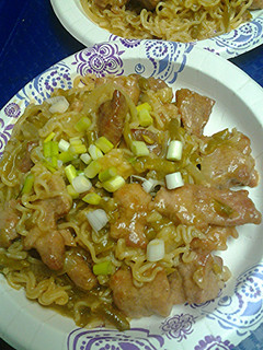 A picture of Ramen noodles pork and green bean stirfry.