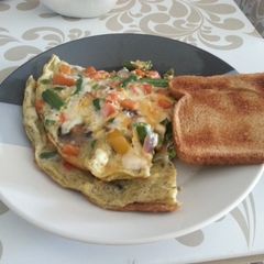 Fully loaded veggie omelette A picture of Fully loaded veggie omelette.