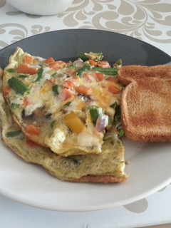 A picture of Fully loaded veggie omelette.