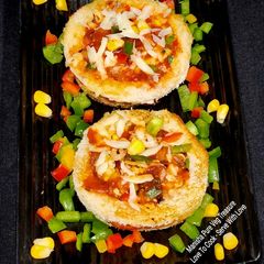 Cheesy Bread Disc Tawa Pizza A picture of Cheesy Bread Disc Tawa Pizza.
