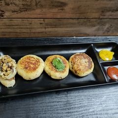 A picture of Mushroom Stuffed Sweet Potato Tikki.