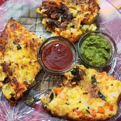 A picture of Veggie delight pan cooked Dhokla.