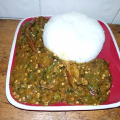 A picture of Tuwon shinkafa & ogbono with okro soup.