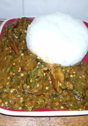 A picture of Tuwon shinkafa & ogbono with okro soup.