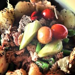 A picture of Cucumber & French beans salad with egg and tuna.