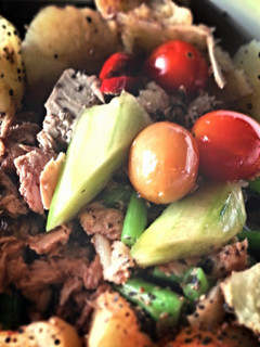A picture of Cucumber & French beans salad with egg and tuna.