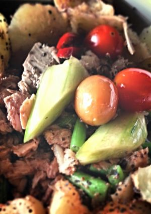 A picture of Cucumber & French beans salad with egg and tuna.