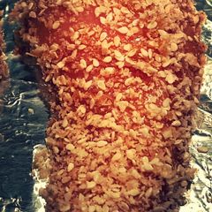 A picture of Sesame encrusted baked chicken.