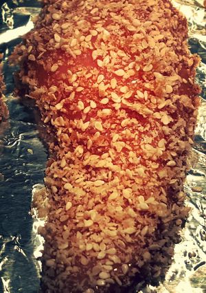 A picture of Sesame encrusted baked chicken.