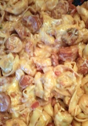 A picture of One pot Tortellini in a creamy tomato sauce.