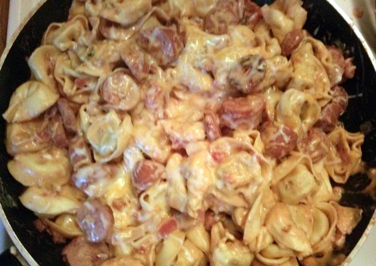 Step-by-Step Guide to Prepare Speedy One pot Tortellini in a creamy tomato sauce