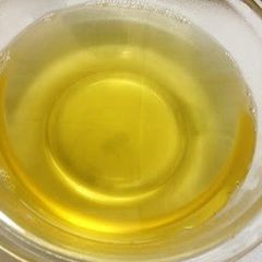 A picture of Golden Dashi Stock with Konbu and Bonito Flakes.