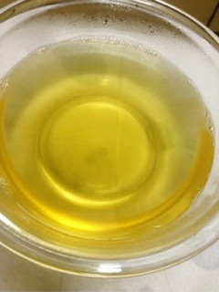 A picture of Golden Dashi Stock with Konbu and Bonito Flakes.