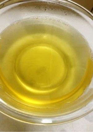 A picture of Golden Dashi Stock with Konbu and Bonito Flakes.