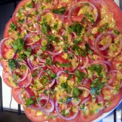 A picture of 'V' Tomato salad.