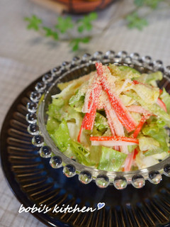 A picture of Lettuce and Imitation Crab Stick Salad.