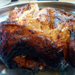 A picture of Grilled whole paprika chicken.