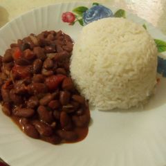 A picture of White rice and beans stew.