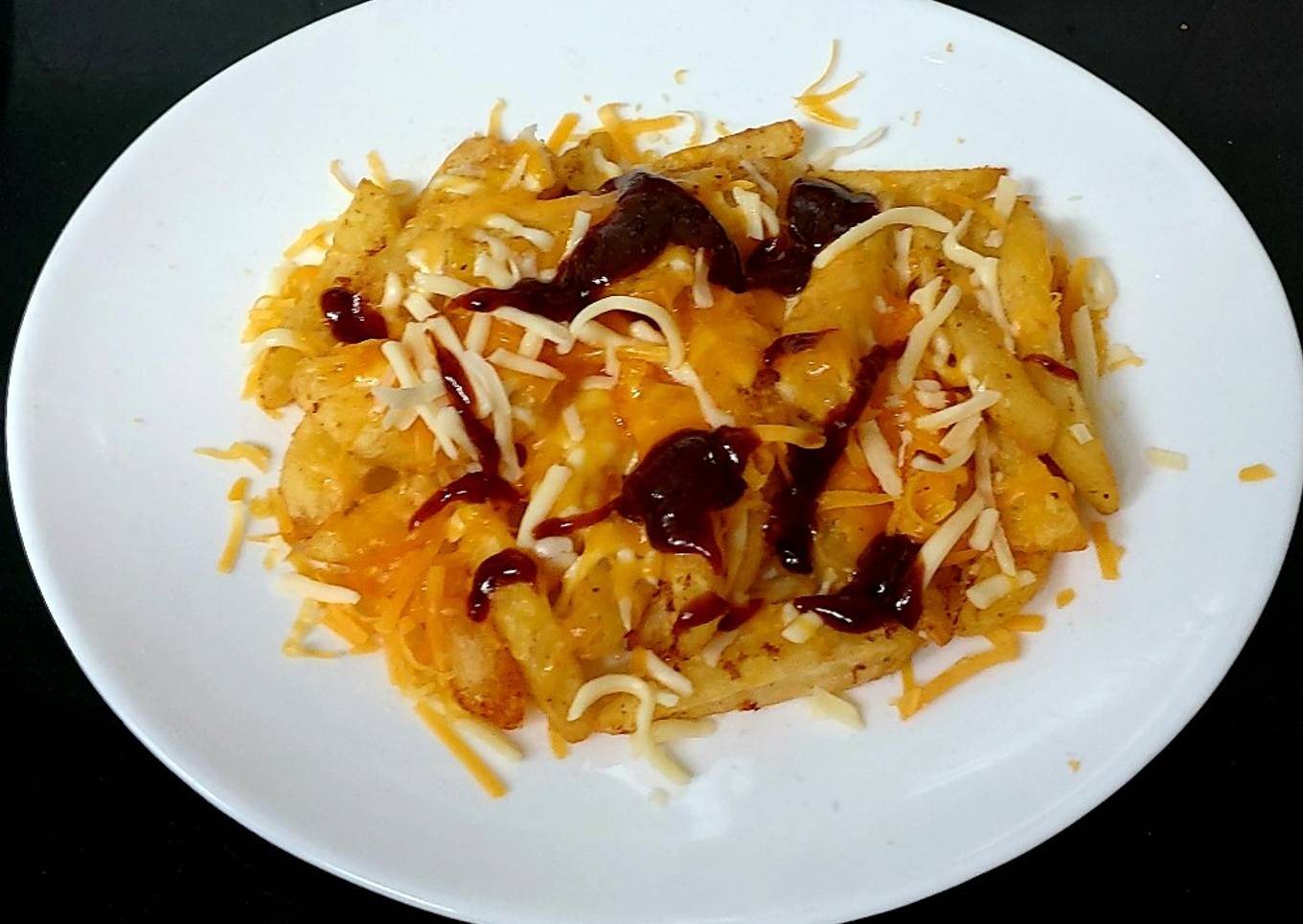 My Two Cheese Melted over Chips & BBQ Sauce