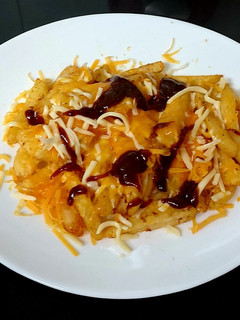 A picture of My Two Cheese Melted over Chips & BBQ Sauce.