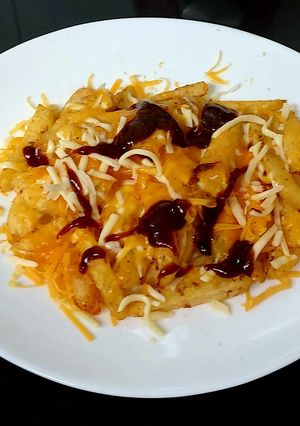 A picture of My Two Cheese Melted over Chips & BBQ Sauce.